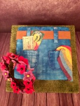 eckige Torte als Jeans mit Taschen; Blumenkranz; Regenbogentuch; Eintrittskarte 